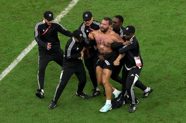 An Argentine fan running naked at the stadium was stopped, adding to the tension between the two teams