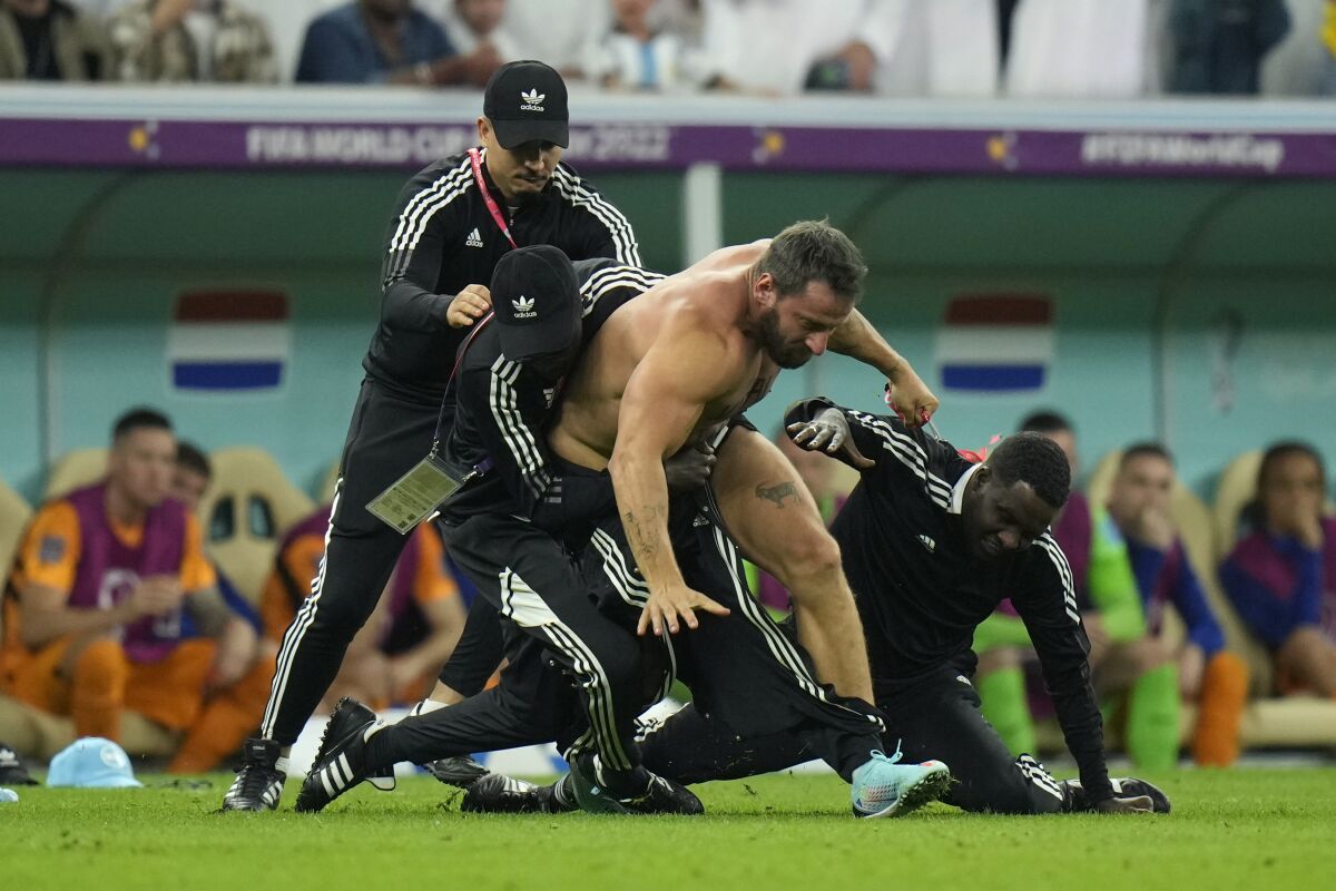 An Argentine fan running naked at the stadium was stopped, adding to the tension between the two teams